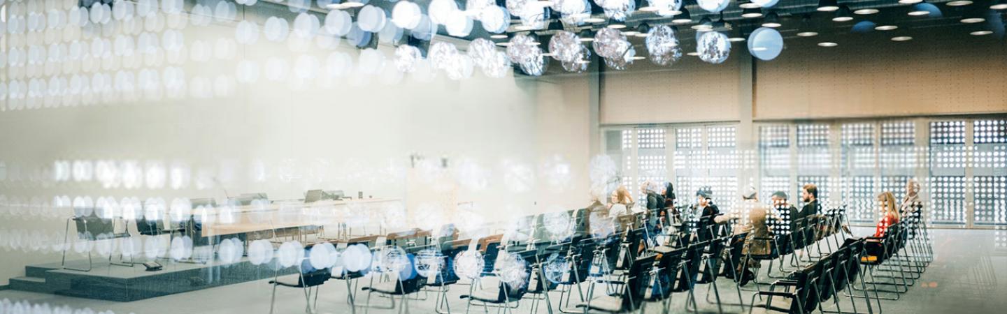 Conference room with light reflecting on window