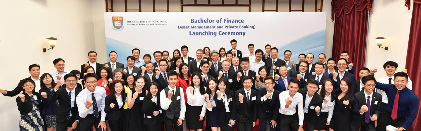 Group of people standing in front of a banner "Bachelor of Finance (Asset Management and Private Banking) Launching Ceremony