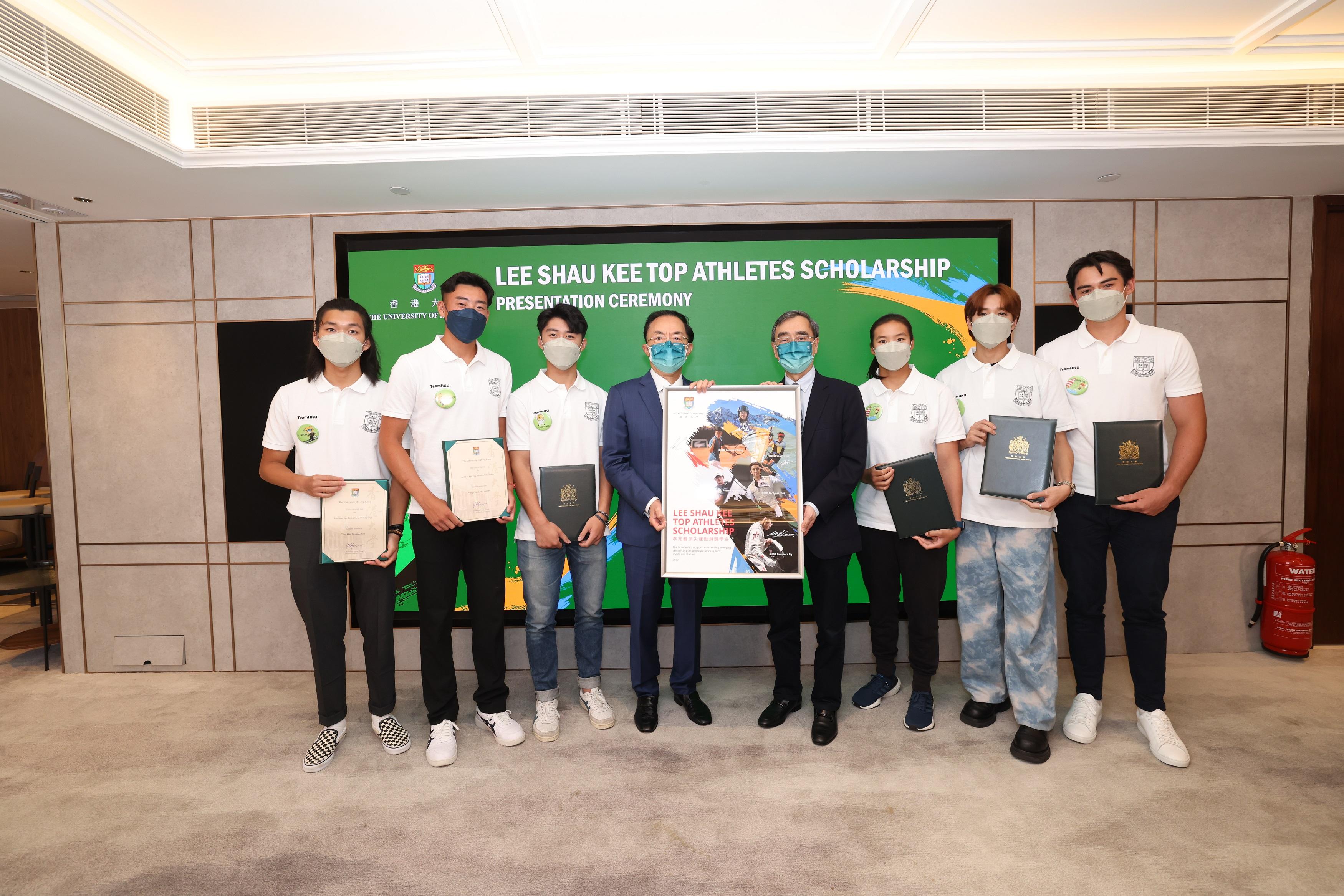 Six outstanding student-athletes are awarded the HKU Lee Shau Kee Top Athletes Scholarship. (From the left) Adrian Yung, Coleman Wong, Lawrence Ng, Vice Chairman of Henderson Land Group Dr Colin Lam, Provost and Deputy Vice-Chancellor of HKU Professor Richard Wong, Sandy Choi, Nicholas Choi and Russell Williams Aylsworth.