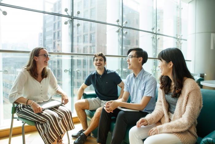 Students of different nationalities are chatting in Chi Wah Learning Common