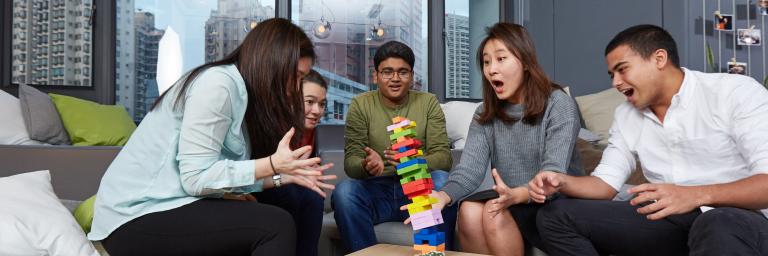 Students playing jenga