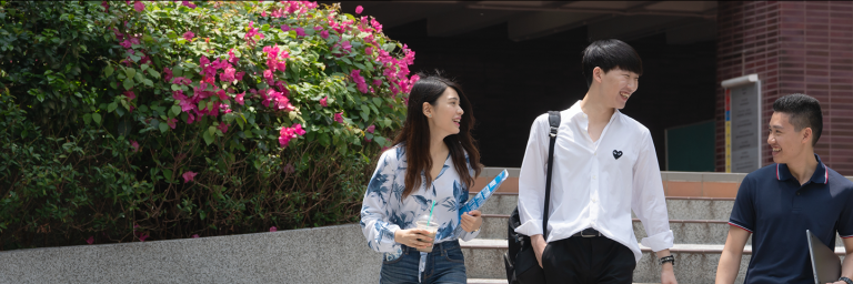 Students walking down stairs on campus